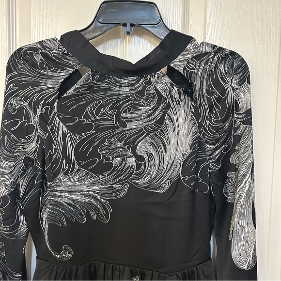 Ted Baker Jazmyna Tie Neck Pleat Mini Dress
in Black Floral Size US 4 / Ted 1 - Picture 8 of 12